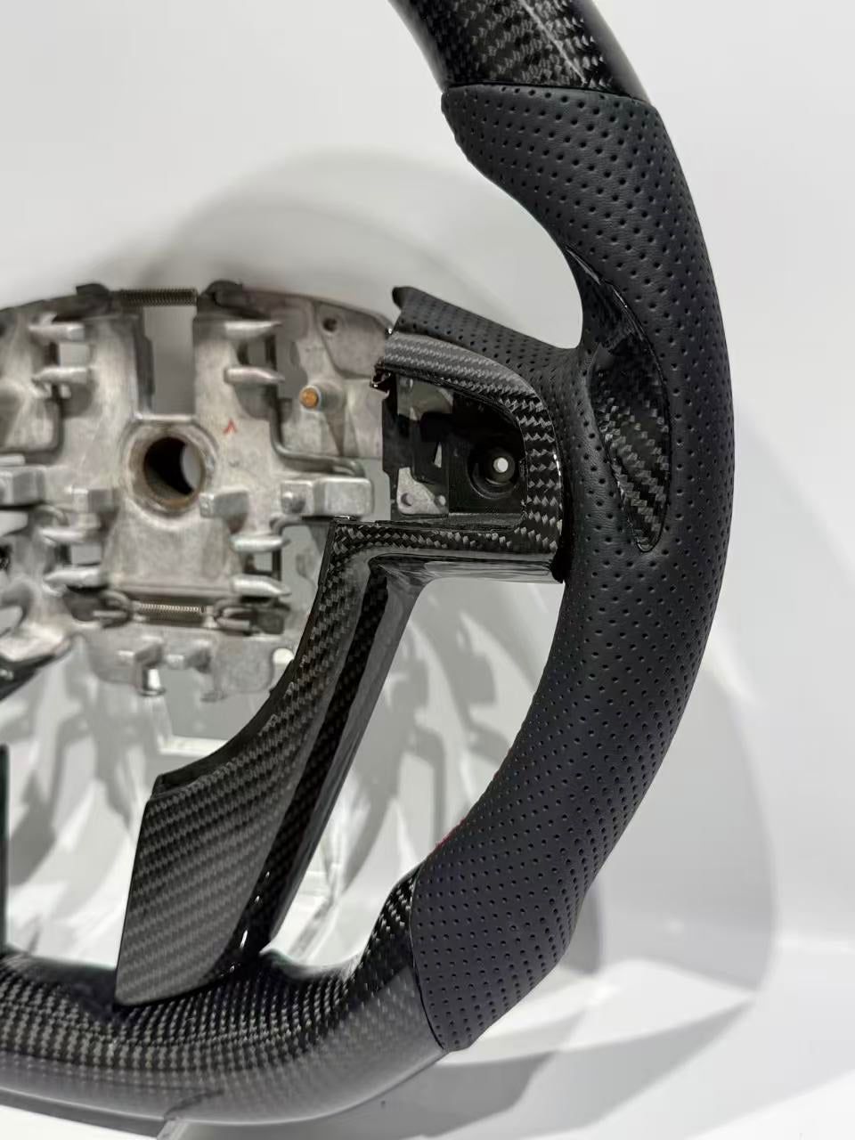 GENOVA Ford Territory SZ carbon fibre steering wheel perforated leather grip detail