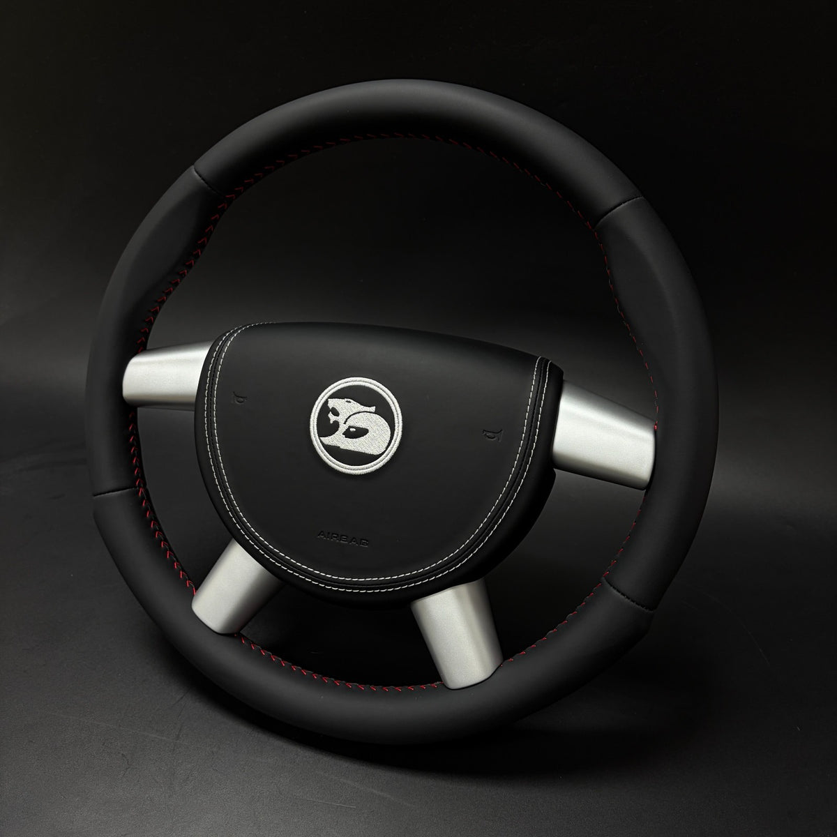 Holden VY VZ steering wheel and cover set, angled view showing carbon fibre sections