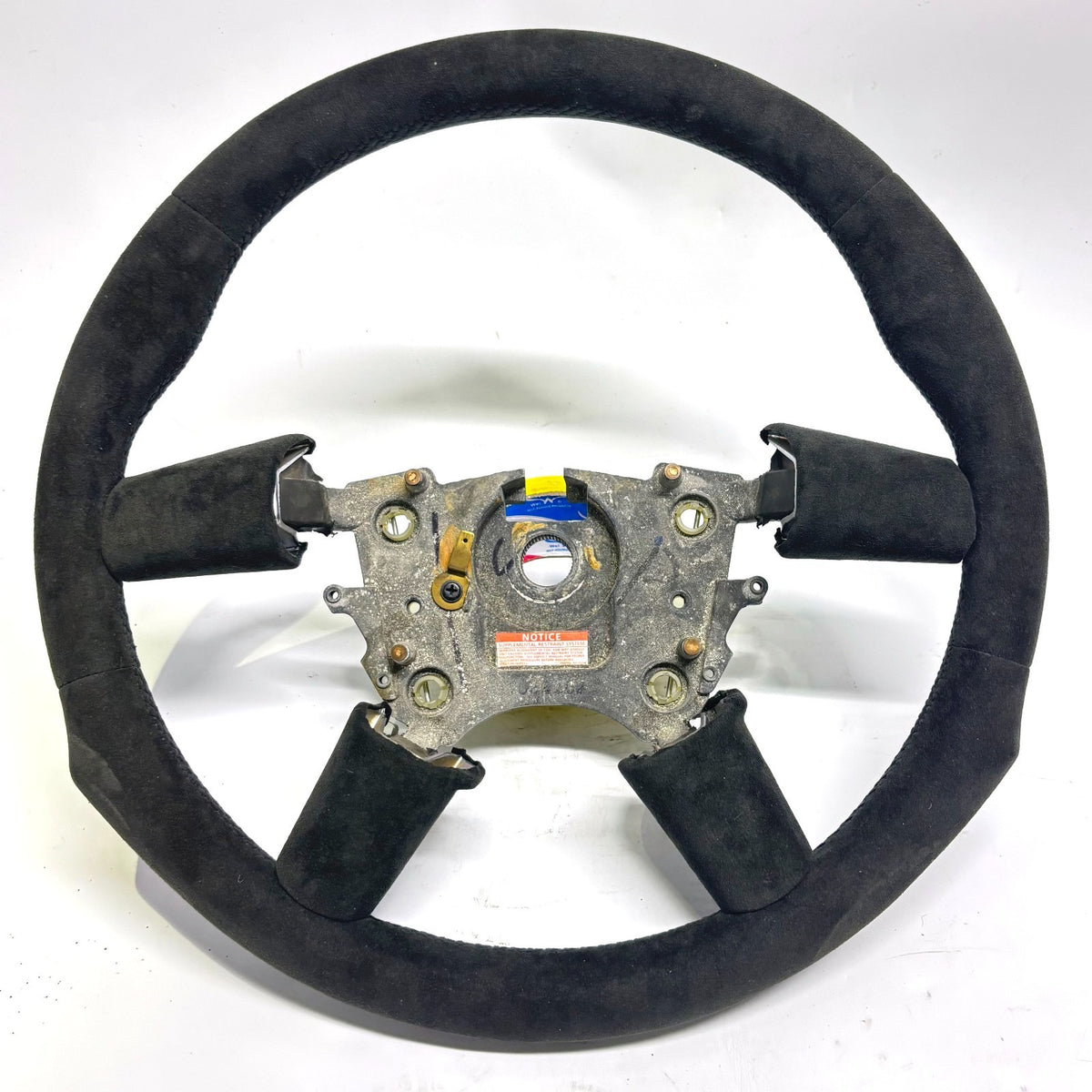 Rear of Holden VY VZ Monaro steering wheel showing factory control mounting points