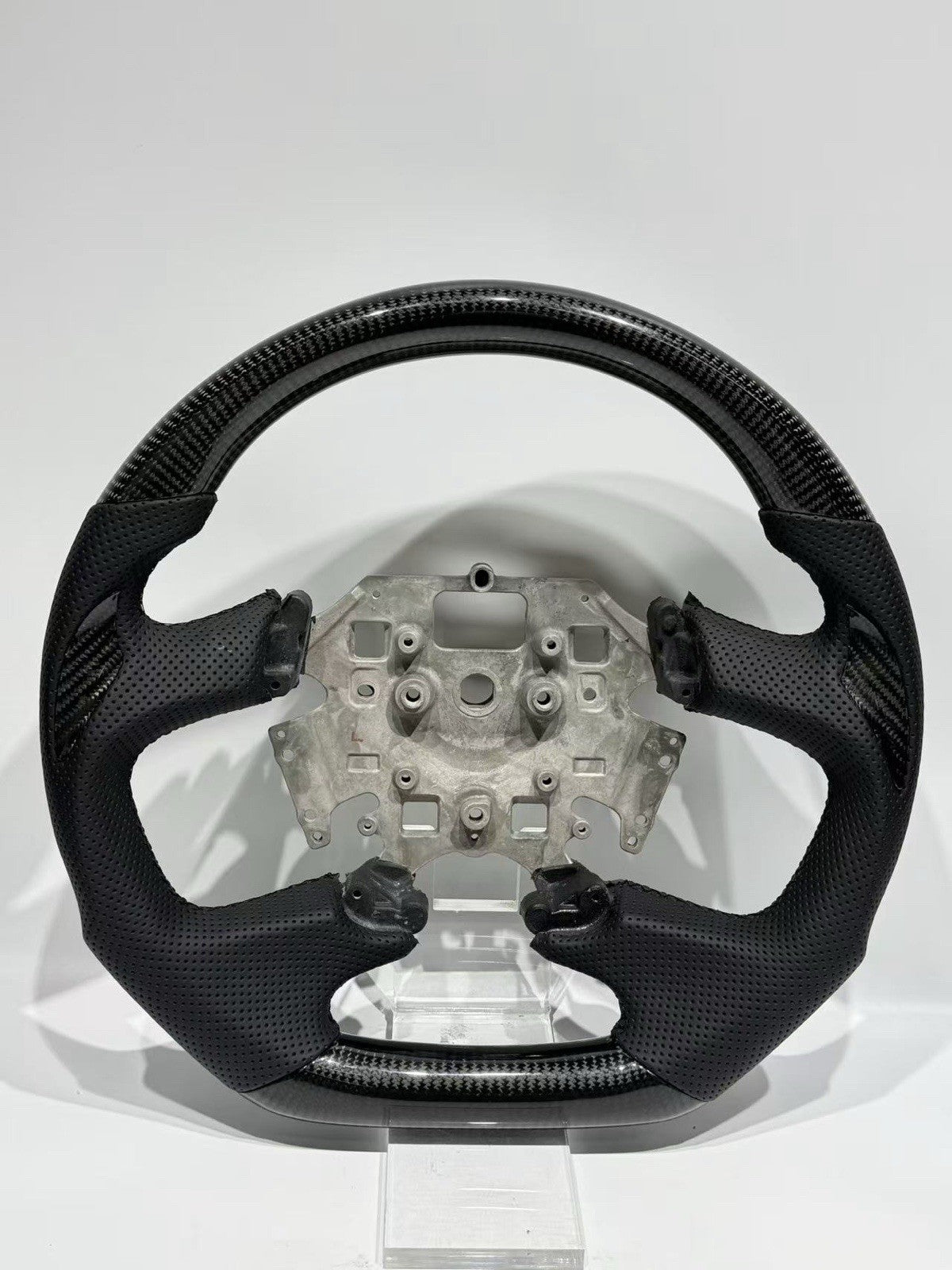 All black carbon fibre and perforated leather steering wheel for Ford Falcon FG MK1, MK2 and FGX, front view